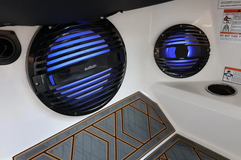 Slide: The Image of 2025 Tigé 24RZX boat speakers with blue LED lighting and stylish flooring. - 36