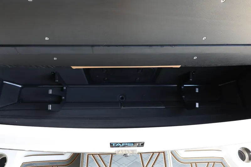 Slide: The Image of 2025 Tigé 24RZX boat storage compartment with TAPS 3T technology. - 48