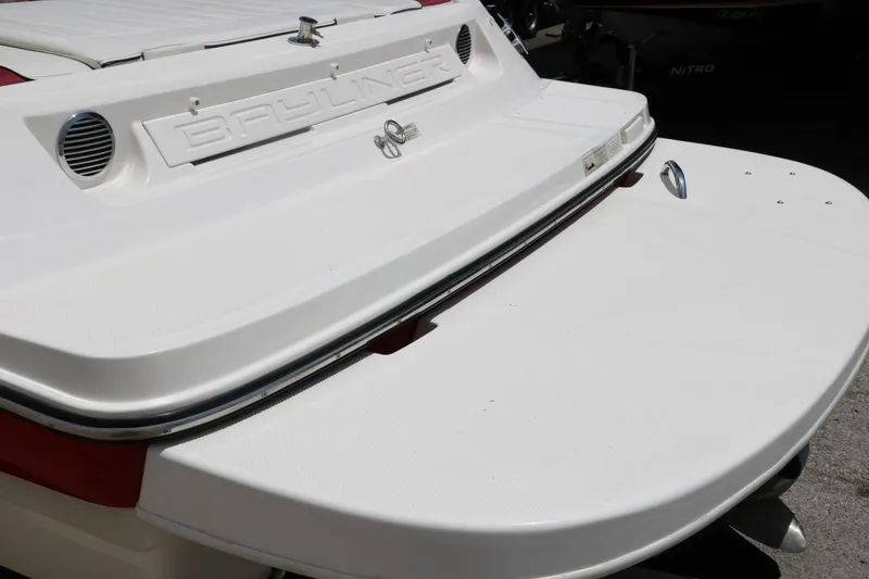 Slide: The Image of 2014 Bayliner 185 BR boat stern with swim platform, showcasing sleek design. - 8