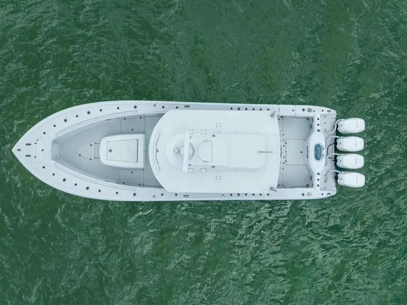 Slide: The Image of Aerial view of 2023 Yellowfin 39 Offshore boat on green water. - 4