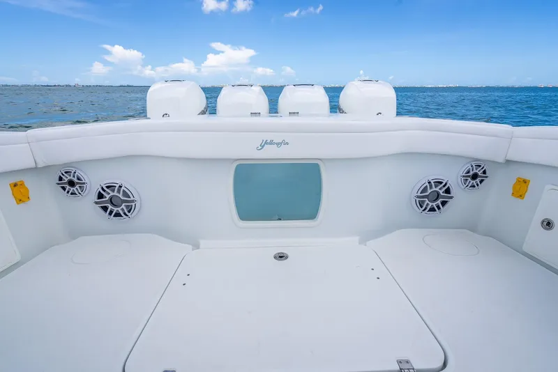 Slide: The Image of 2023 Yellowfin 39 Offshore boat deck with ocean view and speakers. - 45