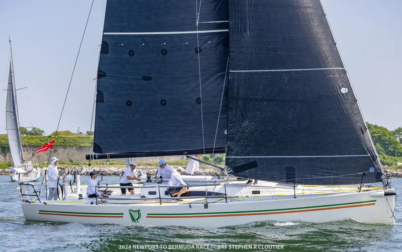 The Image of 2018 J Boats J/121 sailing in Newport to Bermuda Race, crew on deck, black sails. - 0