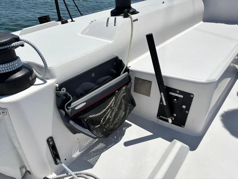 Slide: The Image of 2018 J Boats J/121 cockpit with winch, rope bag, and Harken equipment. - 15