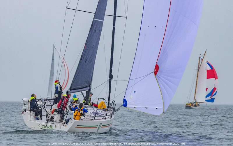 Slide: The Image of 2018 J Boats J/121 sailing in a regatta with colorful spinnaker and crew. - 6