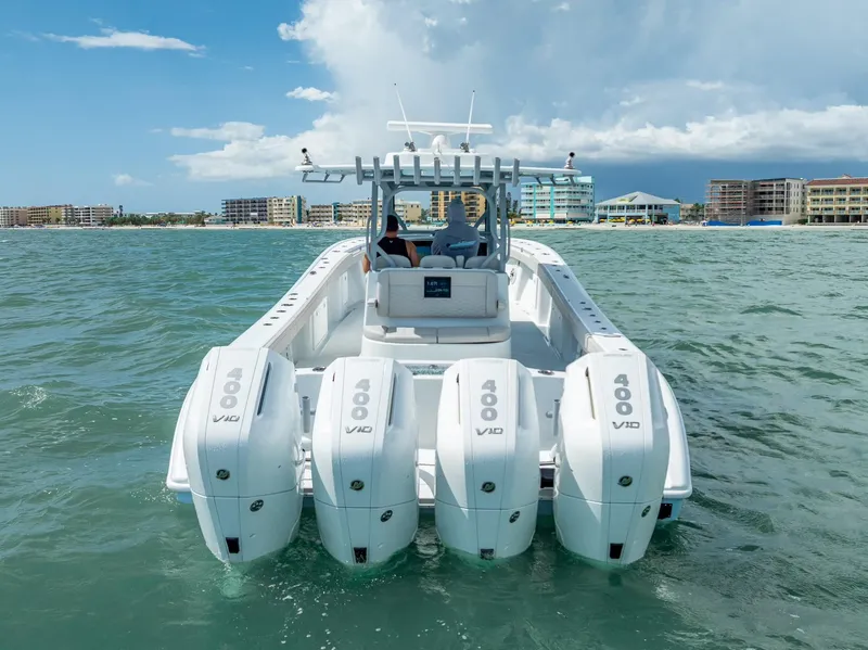 Slide: The Image of 2024 Yellowfin 39 boat with quad 400 V10 engines on the water. - 10