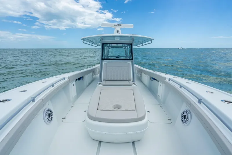 Slide: The Image of 2024 Yellowfin 39 boat on open water, clear sky, spacious deck view. - 42