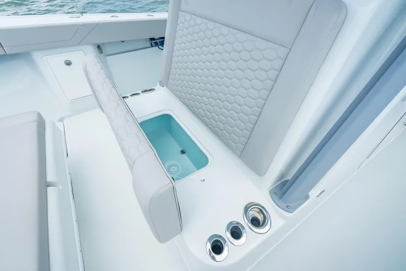 Slide: The Image of 2024 Yellowfin 39 boat interior with seating and storage compartment. - 46