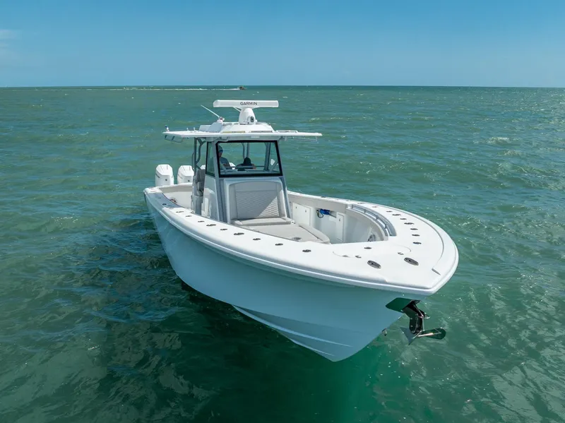 Slide: The Image of 2024 Yellowfin 39 boat on open water, showcasing sleek design and advanced features. - 7