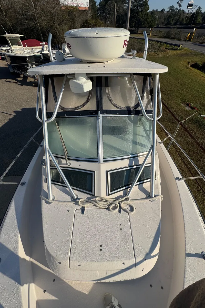 Slide: The Image of 1993 Grady-White Seafarer 22 boat, top view, showcasing deck and windshield. - 8