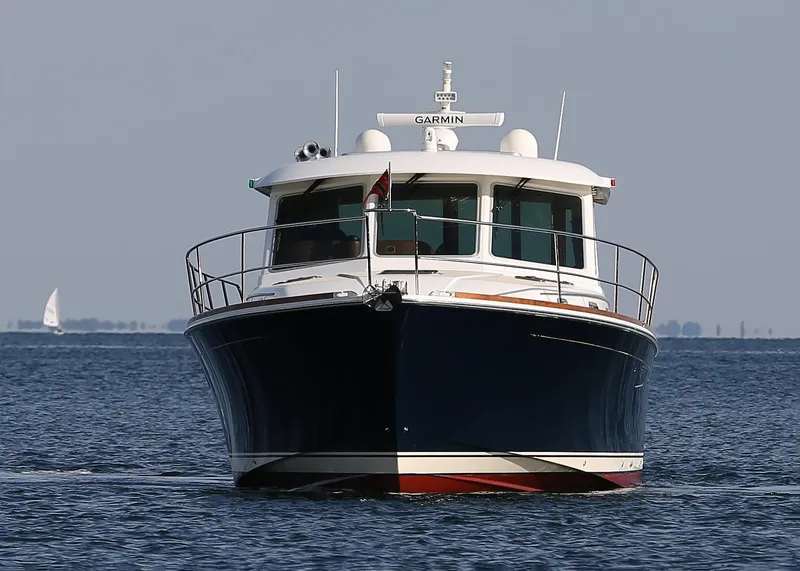The Image of 2017 Sabre 48 Salon Express yacht on open water, front view. - 1