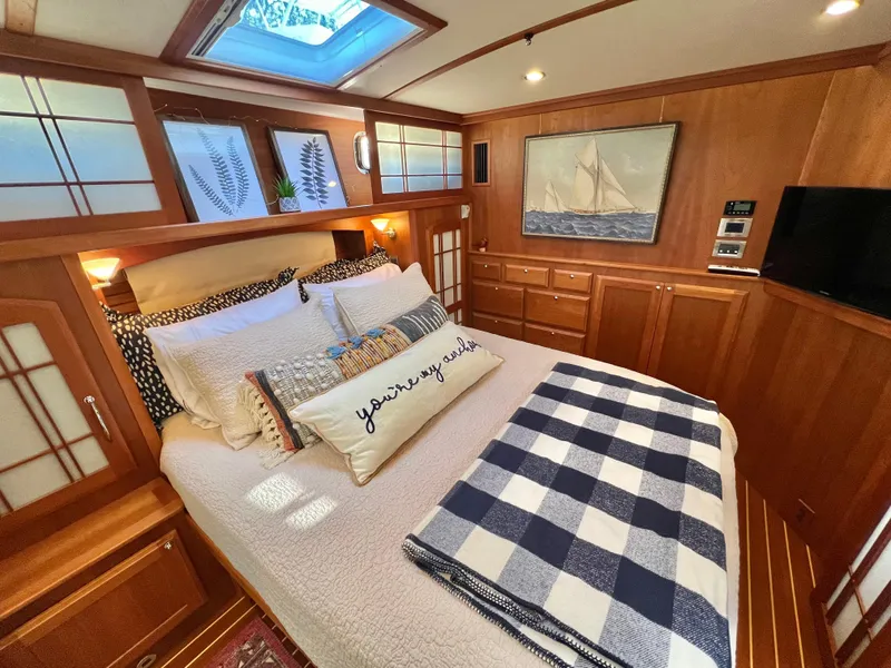 Slide: The Image of Interior of 2017 Sabre 48 Salon Express featuring cozy bedroom. - 27