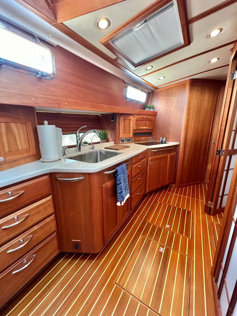 Slide: The Image of Interior of 2017 Sabre 48 Salon Express with elegant wood finish. - 37
