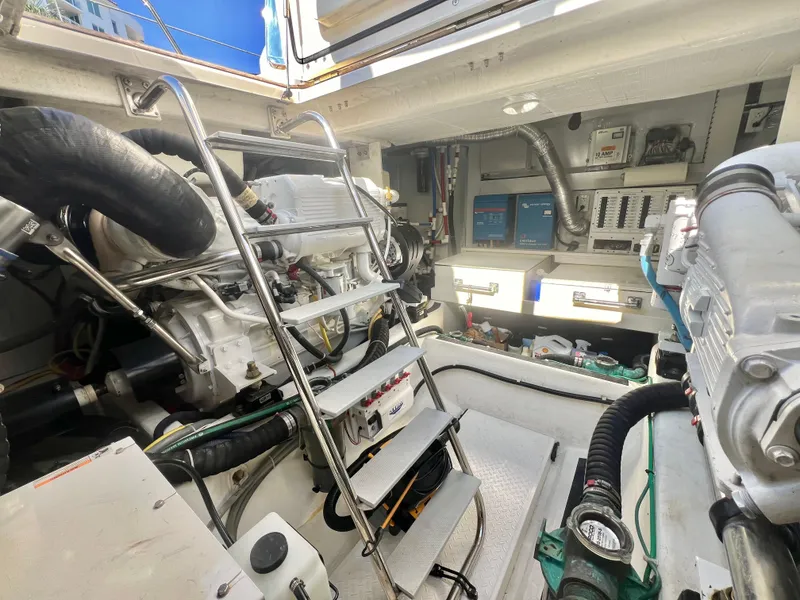 Slide: The Image of Engine room of 2017 Sabre 48 Salon Express with visible machinery and equipment. - 38