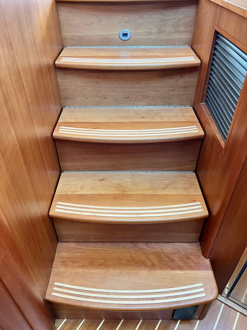 Slide: The Image of Wooden staircase in Sabre 48 Salon Express 2017 yacht. - 41