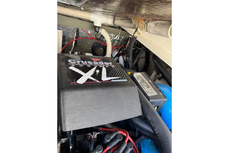 Slide: The Image of Engine compartment of a 1998 Pursuit 2800 Walkaround with Crusader XL engine. - 25