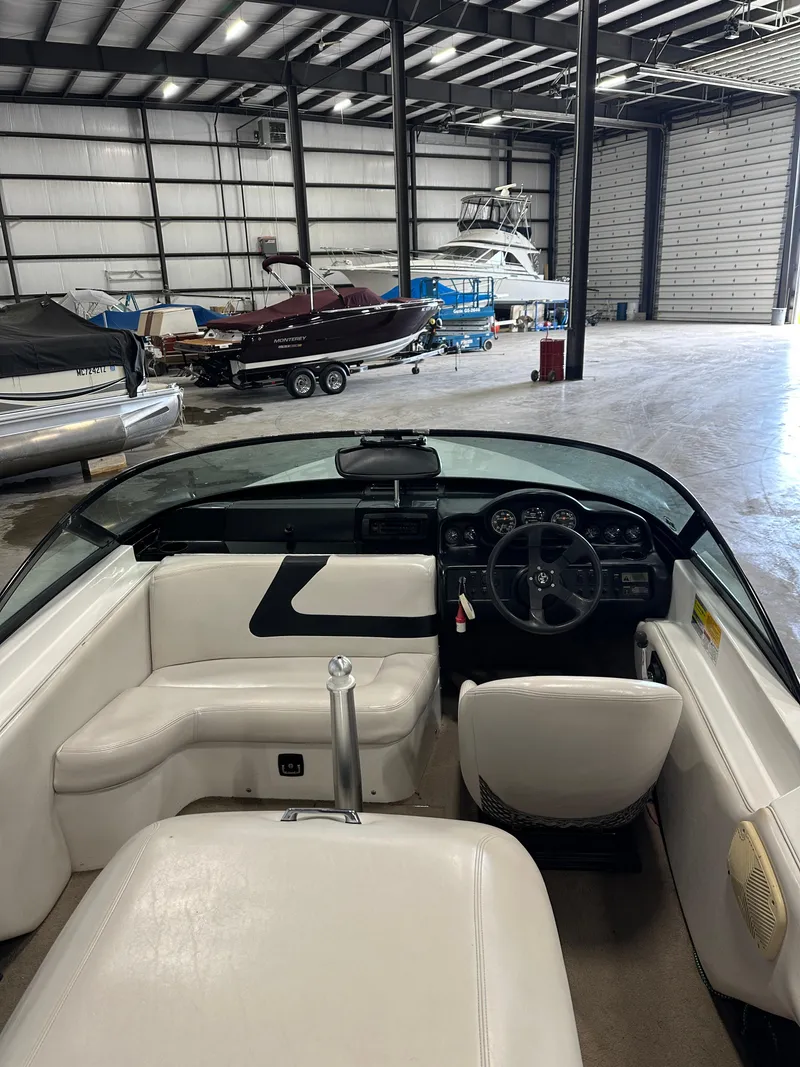 Slide: The Image of 1998 MasterCraft Pro Star 190 boat interior in a spacious storage facility. - 6