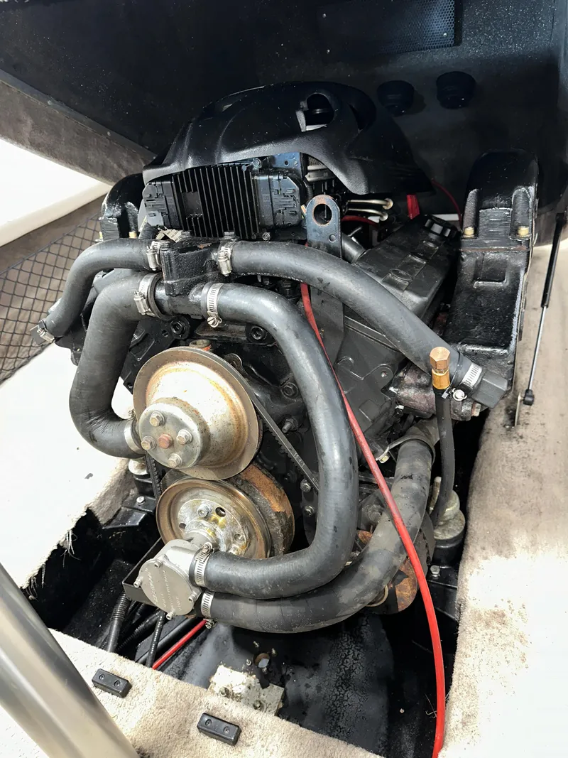 Slide: The Image of 1998 MasterCraft Pro Star 190 engine with visible hoses and components. - 9