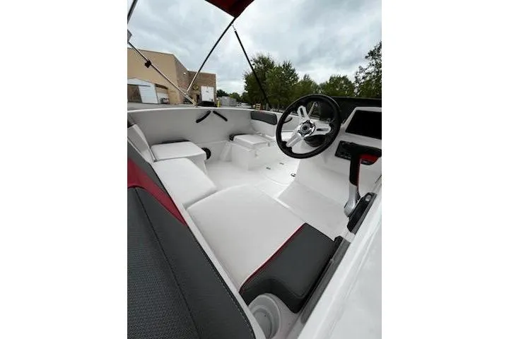 Slide: The Image of Interior of 2025 Tahoe T16 boat with modern steering and seating. - 11