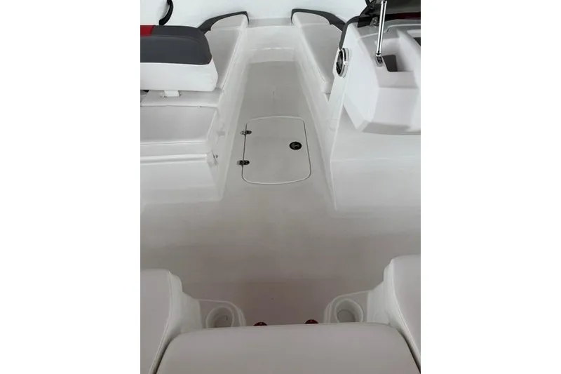 Slide: The Image of 2025 Tahoe T16 boat interior with seating and storage compartments. - 8