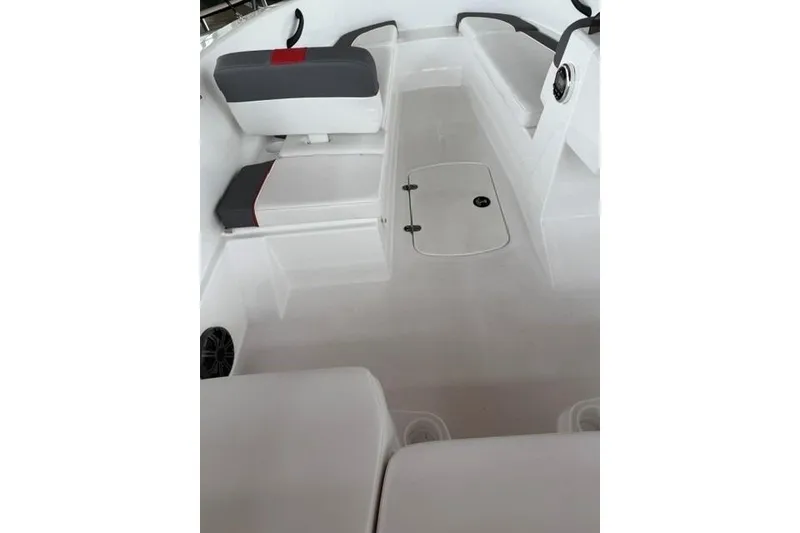 Slide: The Image of 2025 Tahoe T16 boat interior with seating and storage compartments. - 10