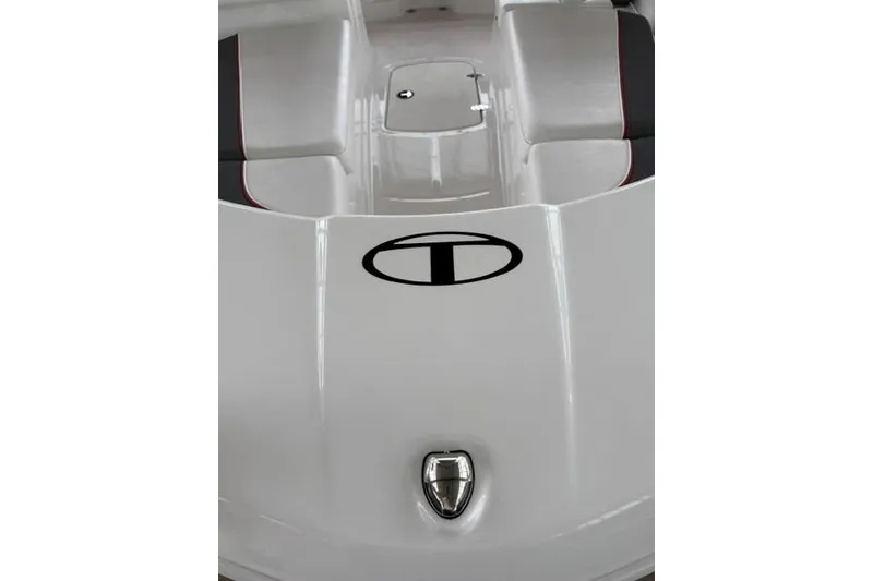 Slide: The Image of 2025 Tahoe T16 boat interior with sleek white design and logo. - 12