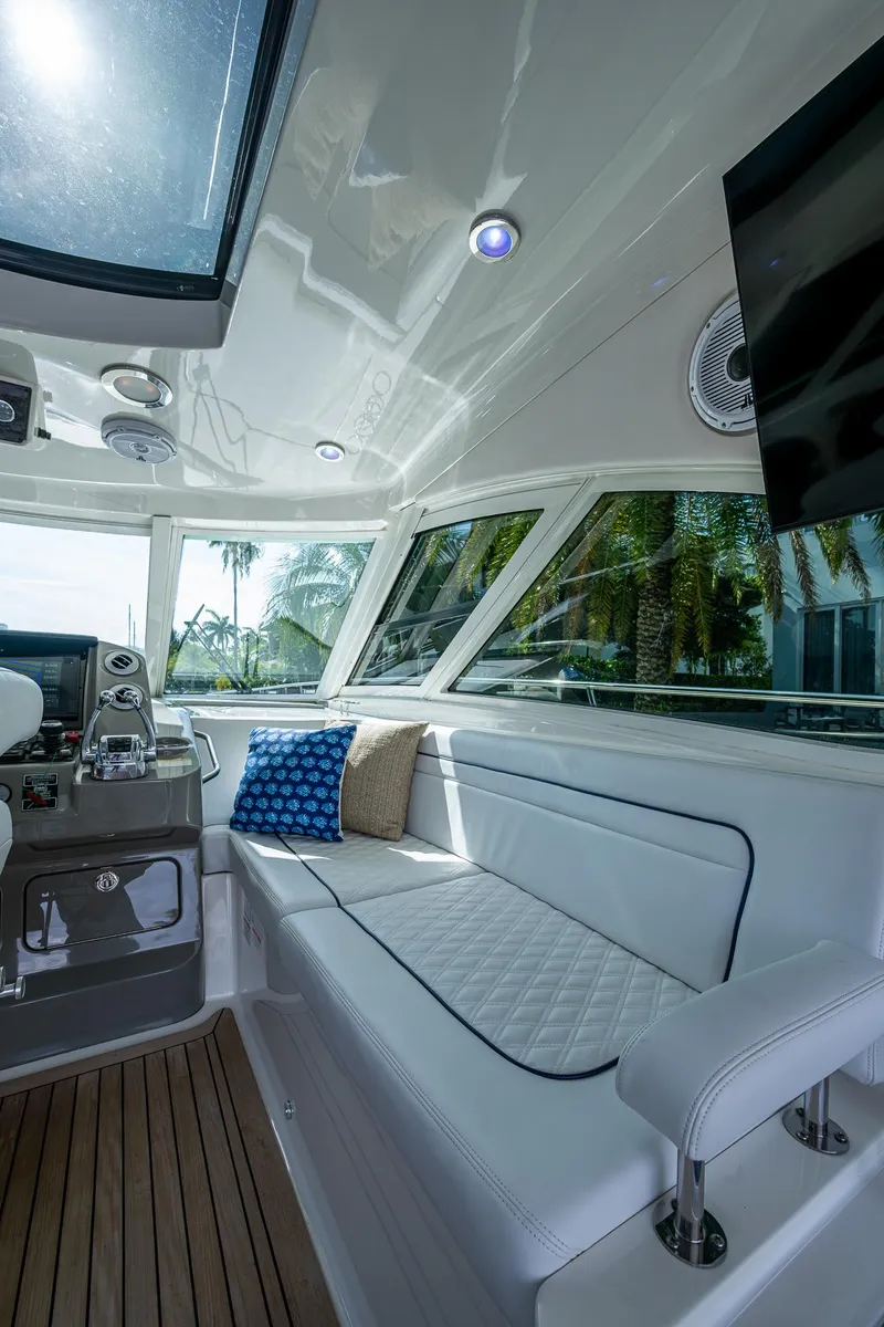 Slide: The Image of Luxurious interior of 2012 Sea Ray 540 Sundancer yacht with plush seating and modern design. - 28