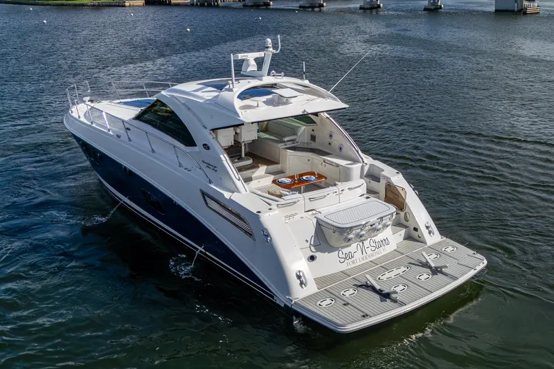 Slide: The Image of 2012 Sea Ray 540 Sundancer yacht cruising on open water. - 3