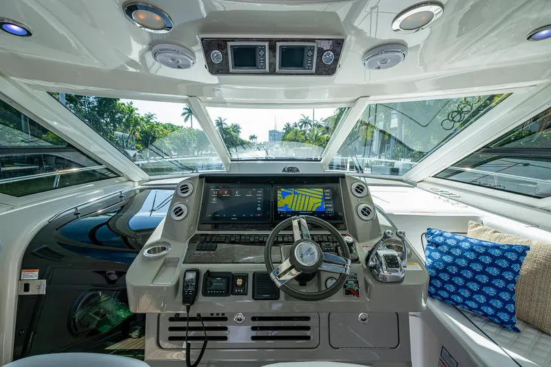 Slide: The Image of Helm of 2012 Sea Ray 540 Sundancer yacht with modern navigation equipment. - 31