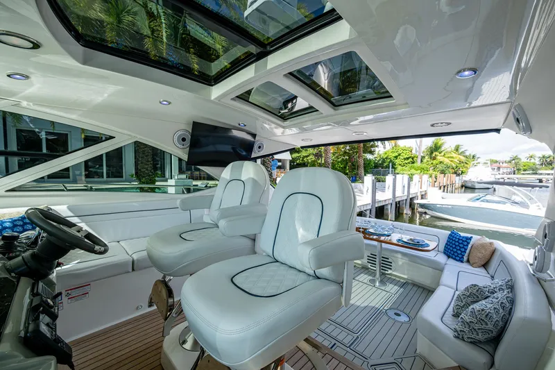 Slide: The Image of Luxurious interior of 2012 Sea Ray 540 Sundancer yacht with plush seating and modern design. - 33
