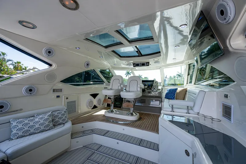 Slide: The Image of Luxurious interior of 2012 Sea Ray 540 Sundancer yacht with plush seating and modern design. - 37