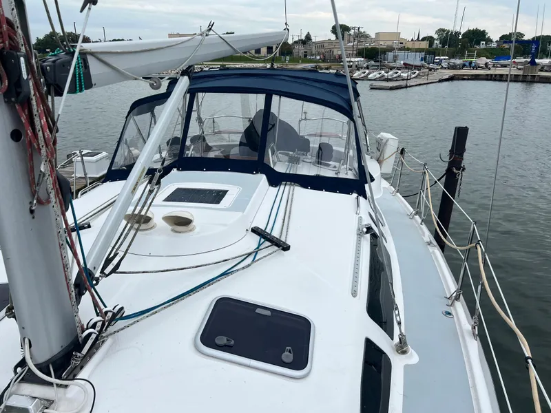 Slide: The Image of Sailboat Hunter 410, 2000 model, docked at marina with clear deck view. - 18