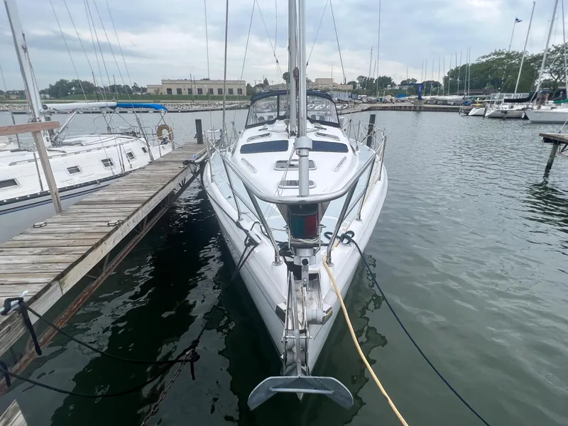 Slide: The Image of Sailboat docked in marina, Hunter 410 model, year 2000. - 4