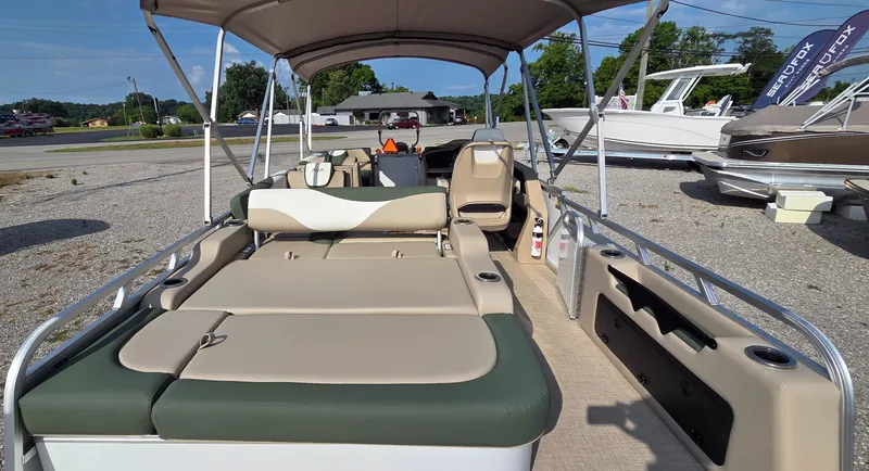 Slide: The Image of 2025 Avalon Platinum LSZ 2585 Versatile Rear Bench pontoon boat with spacious seating and canopy. - 11