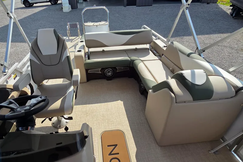 Slide: The Image of 2025 Avalon Platinum LSZ 2585 Versatile Rear Bench interior with luxurious seating and steering console. - 7