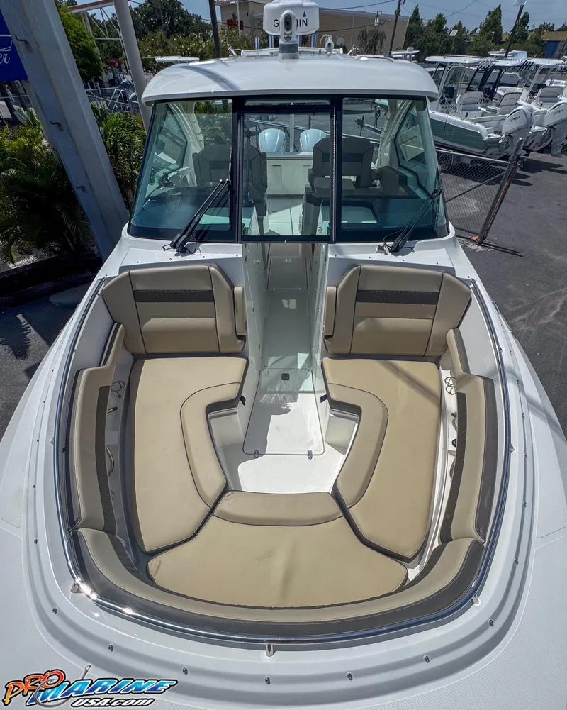 Slide: The Image of 2021 Pursuit DC 326 Dual Console boat with spacious seating and sleek design. - 41
