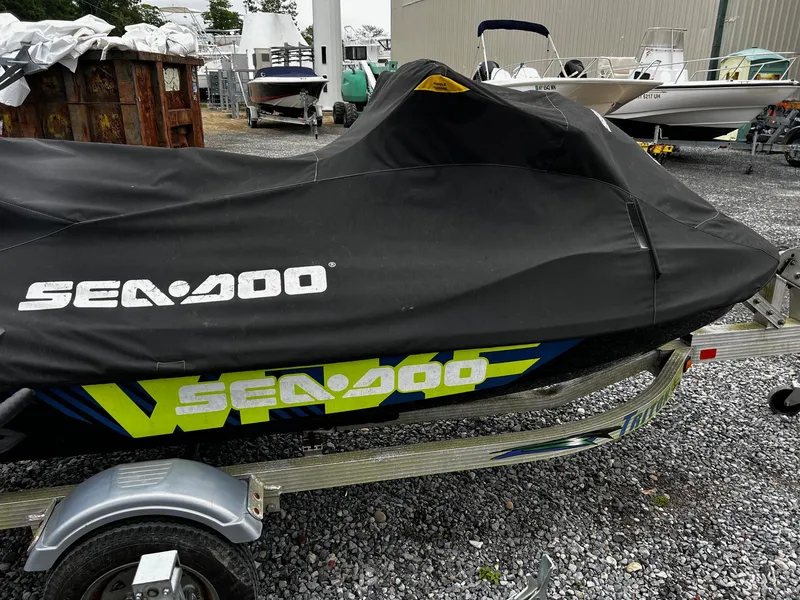 Slide: The Image of 2017 Sea-Doo Wake Pro 230 covered on trailer in a boatyard. - 9