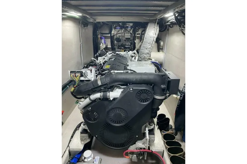 Slide: The Image of Engine room of 2022 Custom Freestyle Marine 32 boat, showcasing detailed machinery. - 38