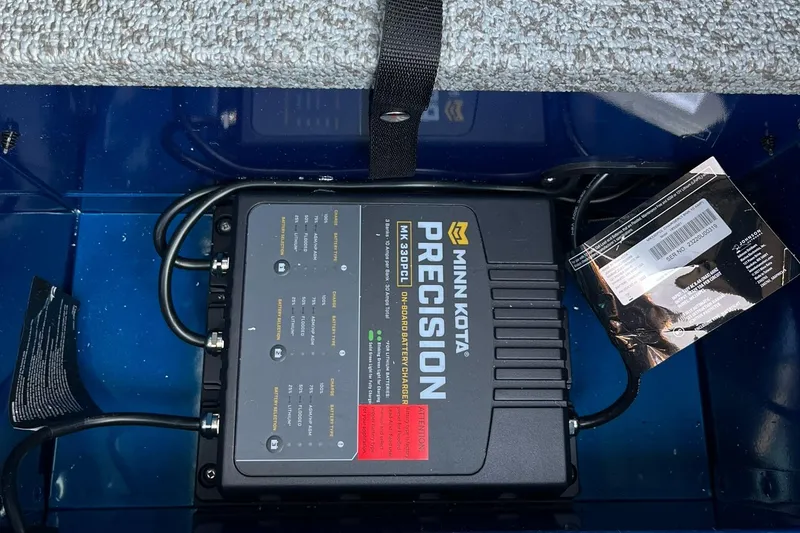 Slide: The Image of Minn Kota Precision battery charger in 2026 Lund 1675 Adventure Sport boat. - 24