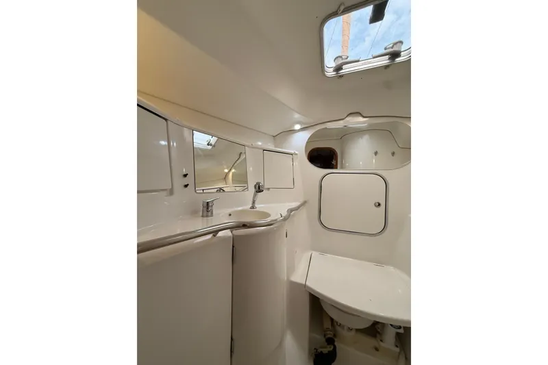 Slide: The Image of Interior of 1997 Beneteau Oceanis 40 CC yacht bathroom with sink and mirror. - 22