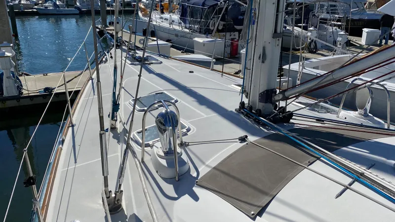 Slide: The Image of Deck view of 2008 Jeanneau Sun Odyssey 54 DS sailboat in marina. - 12