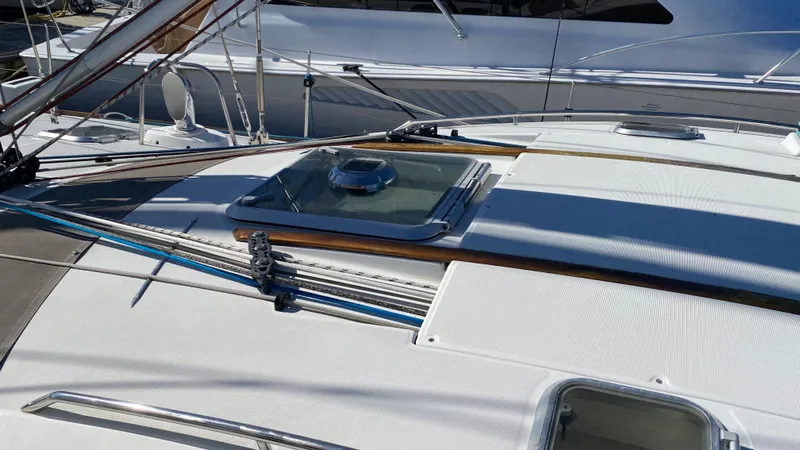 Slide: The Image of Deck view of 2008 Jeanneau Sun Odyssey 54 DS sailboat, featuring sleek design and rigging. - 13
