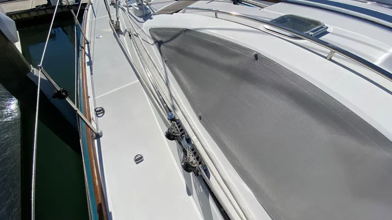 Slide: The Image of Deck view of 2008 Jeanneau Sun Odyssey 54 DS sailboat, showcasing sleek design and rigging. - 15