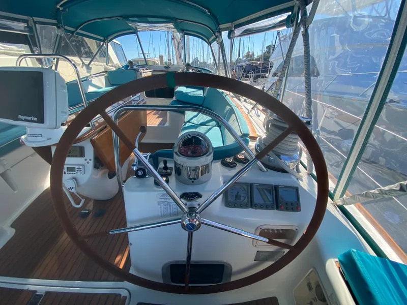 Slide: The Image of Cockpit of 2008 Jeanneau Sun Odyssey 54 DS sailboat with steering wheel and navigation instruments. - 30