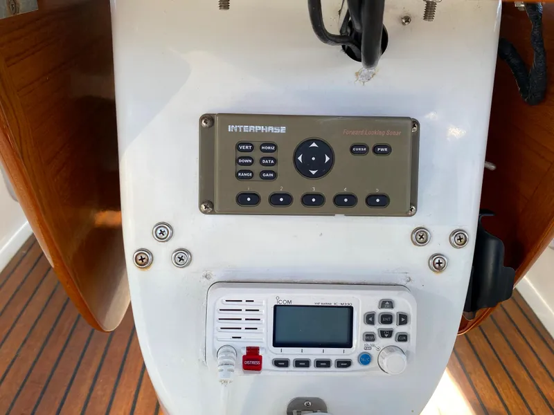 Slide: The Image of Control panel on 2008 Jeanneau Sun Odyssey 54 DS yacht, featuring navigation and communication equipment. - 32
