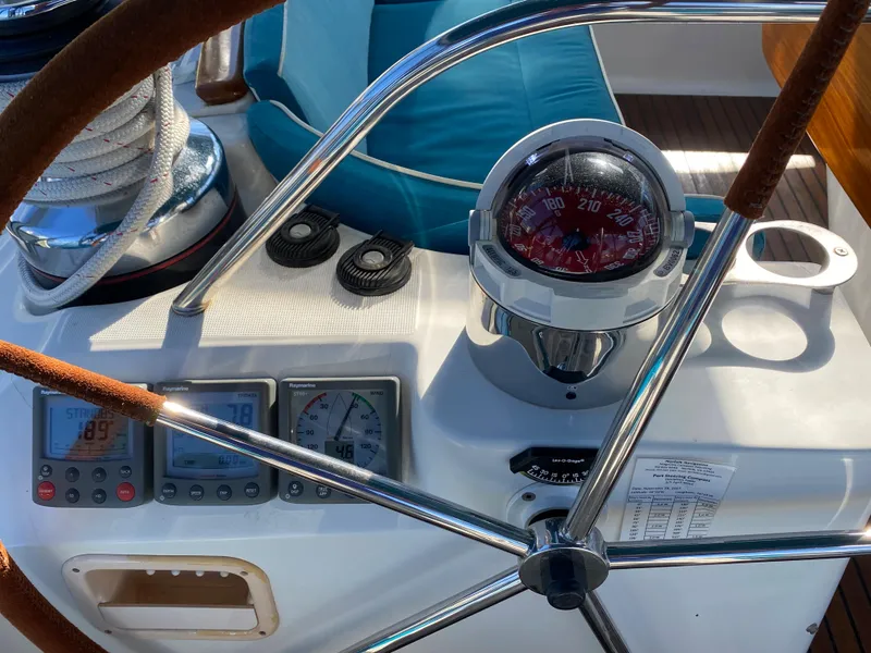 Slide: The Image of Steering wheel and navigation instruments on 2008 Jeanneau Sun Odyssey 54 DS yacht. - 33