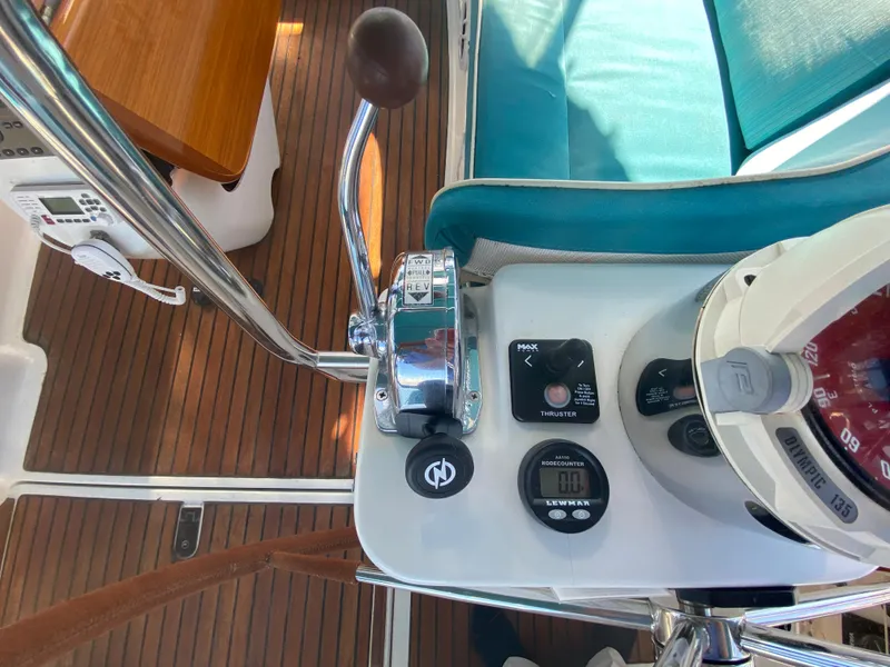 Slide: The Image of Cockpit controls of 2008 Jeanneau Sun Odyssey 54 DS sailboat with wooden deck. - 35