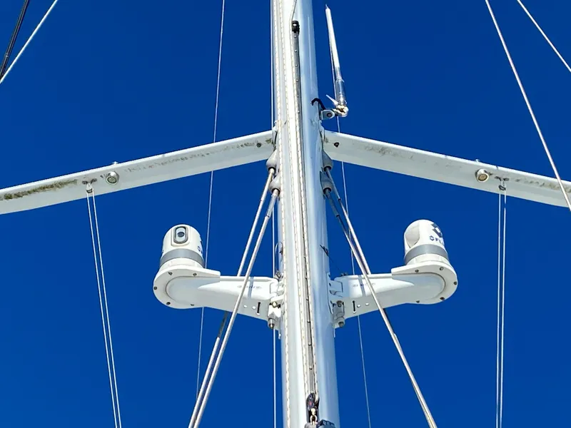 Slide: The Image of Mast of 2008 Jeanneau Sun Odyssey 54 DS sailboat against clear blue sky. - 4