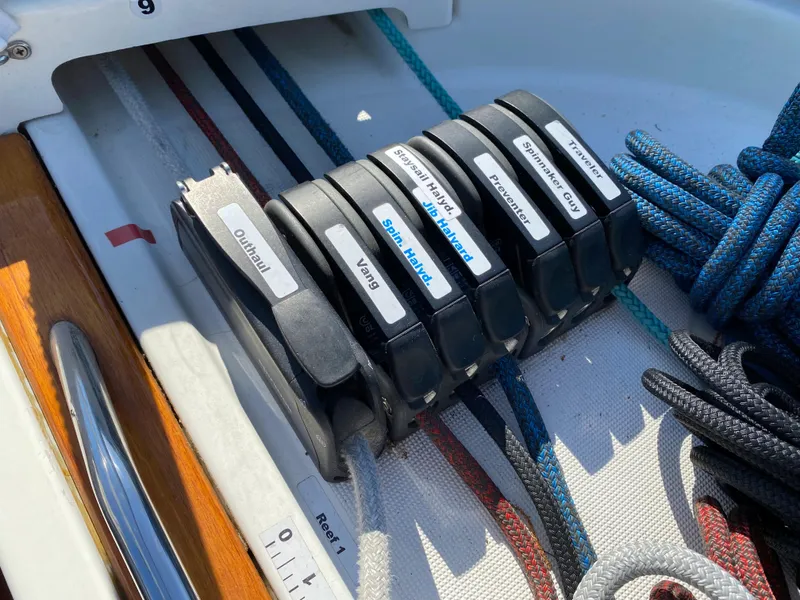 Slide: The Image of Sailing ropes and labeled clutches on a 2008 Jeanneau Sun Odyssey 54 DS yacht. - 44