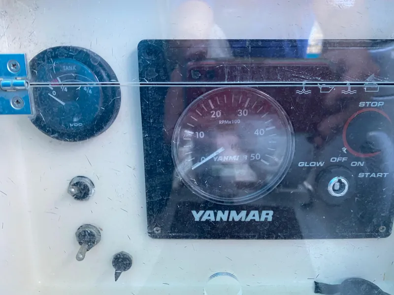Slide: The Image of Control panel of a 2008 Jeanneau Sun Odyssey 54 DS sailboat with Yanmar engine gauges. - 46