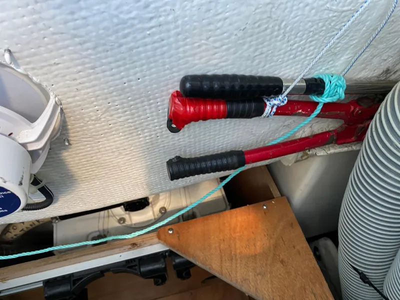 Slide: The Image of Storage area on a 2008 Jeanneau Sun Odyssey 54 DS sailboat with tools and equipment. - 47